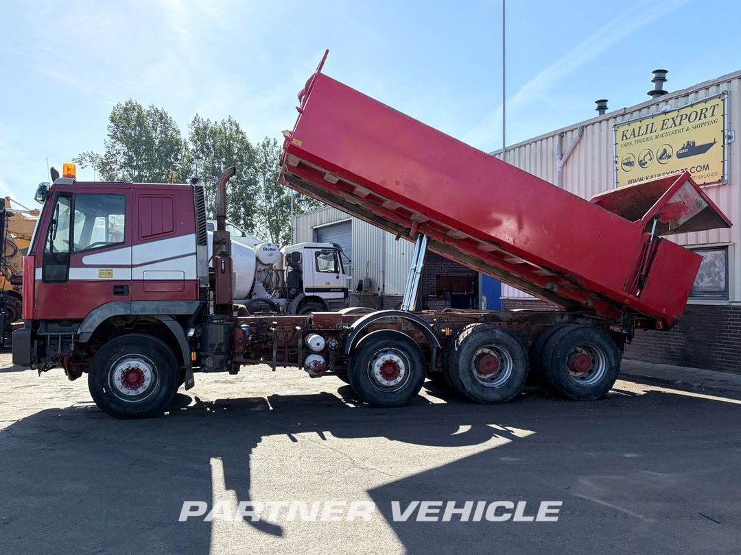 frontLeft : Iveco 340-E44H Camión Volquete